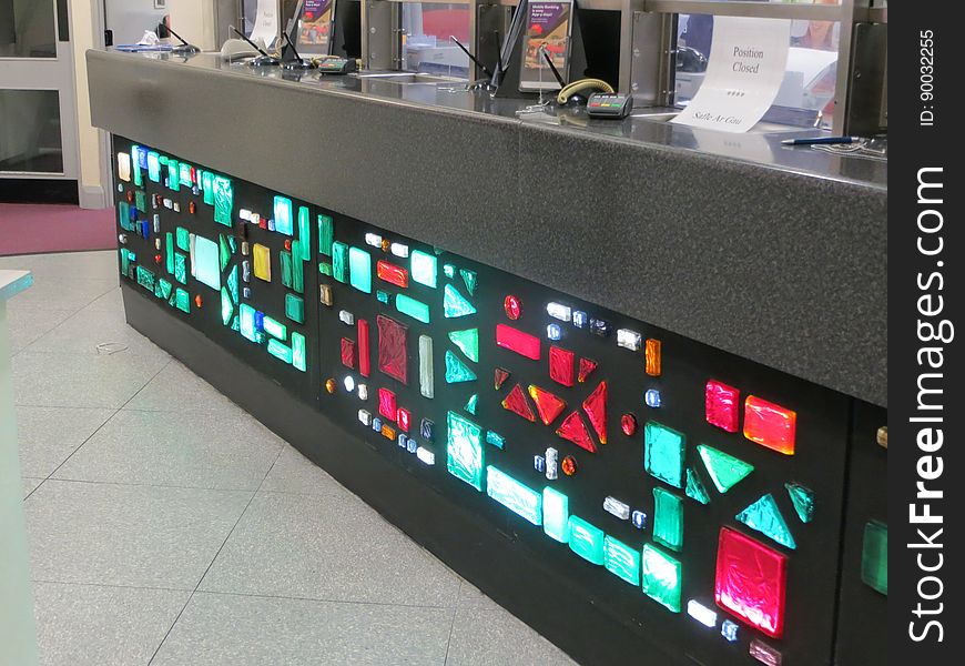 The illuminated counter was a feature of this bank branch for decades, although it had been cut down a bit from its original size when this picture was taken in 2014. With counters out of fashion in banks nowadays, this counter has since been removed. Happily, a small part of the glasswork has been retained as a wall decoration. The illuminated counter was a feature of this bank branch for decades, although it had been cut down a bit from its original size when this picture was taken in 2014. With counters out of fashion in banks nowadays, this counter has since been removed. Happily, a small part of the glasswork has been retained as a wall decoration.