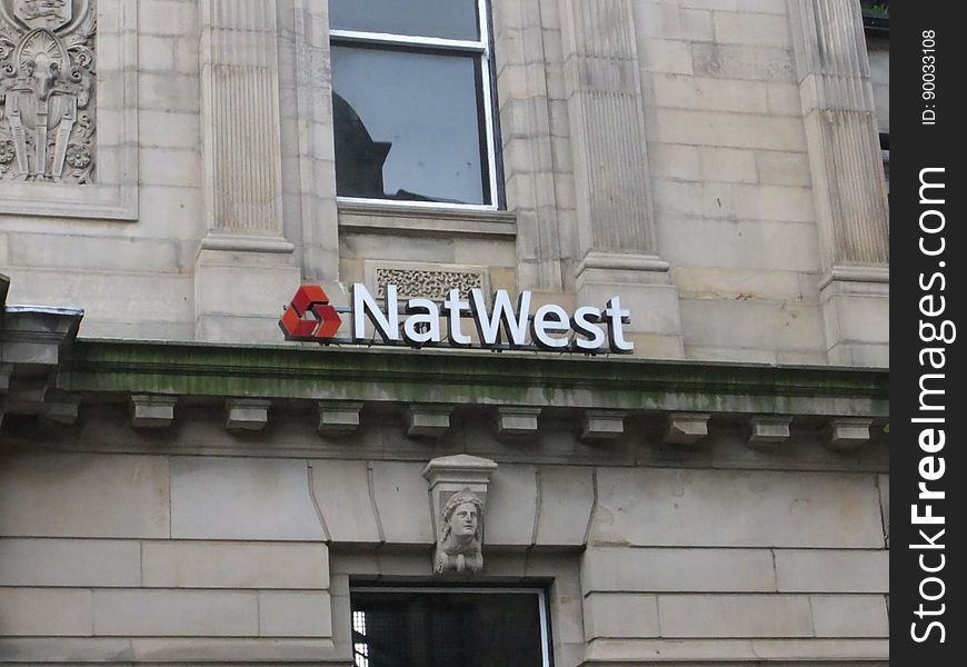 NatWest bank branch with a back-to-front logo on their sign. Not sure how that could have happened!. NatWest bank branch with a back-to-front logo on their sign. Not sure how that could have happened!