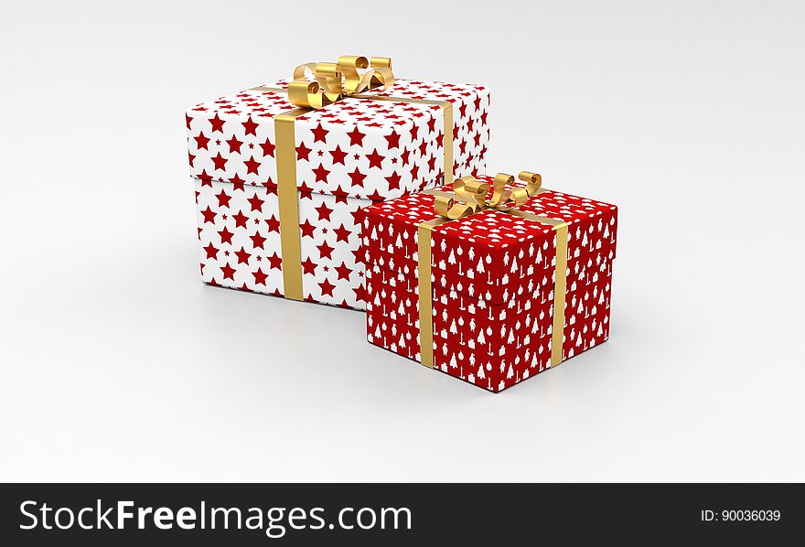 A pair of presents wrapped in paper with ribbons. A pair of presents wrapped in paper with ribbons.