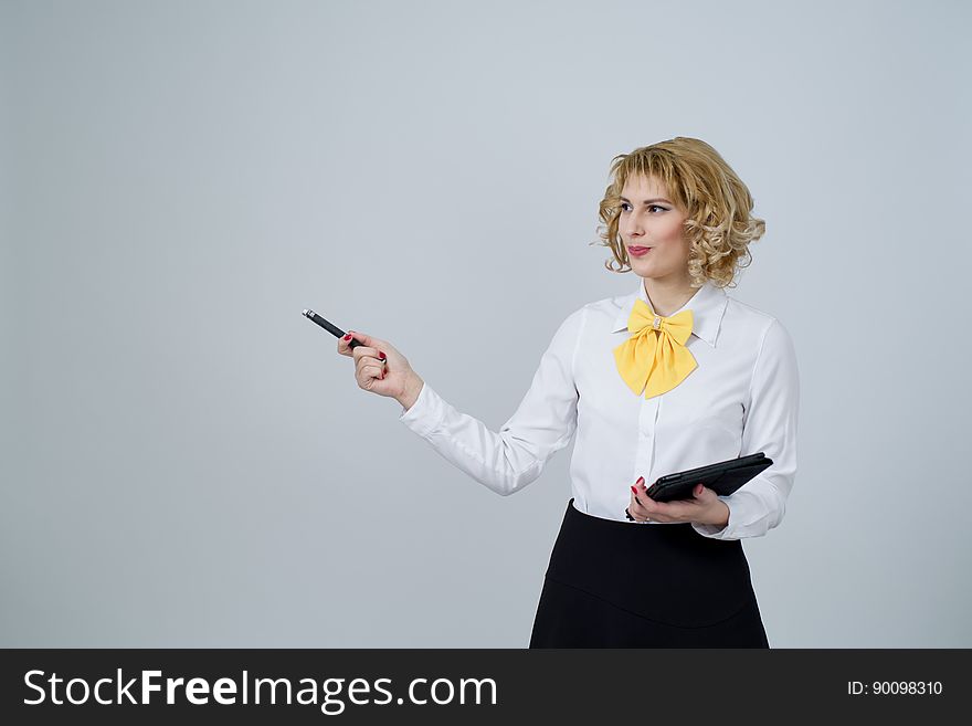 Portrait Of Young Woman Against White Background