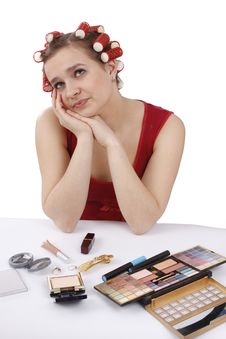 Woman With Hair-rollers Thinks About Something. Stock Photography Woman With Hair-rollers Thinks About Something. Stock Photography