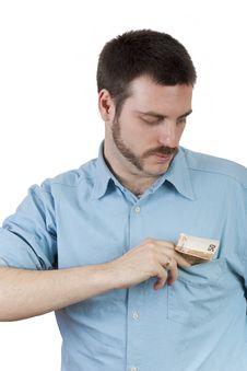 Man Putting Money In The Pocket Stock Photos Man Putting Money In The Pocket Stock Photos