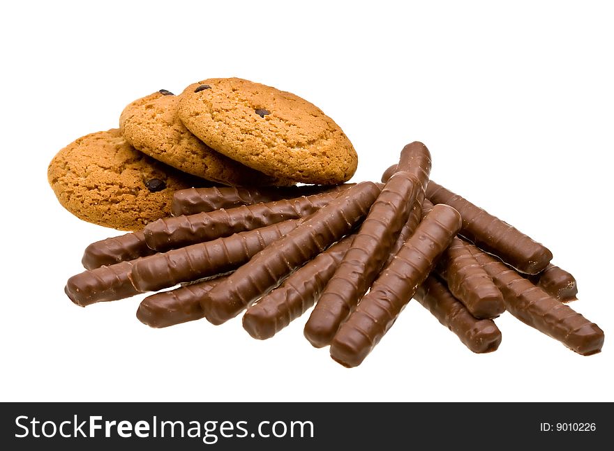 Chocolate and biscuits isolated on white background