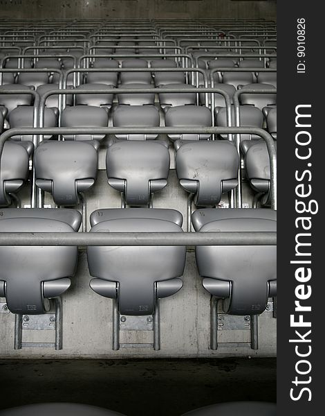 Foldable seat rows in a sports stadium