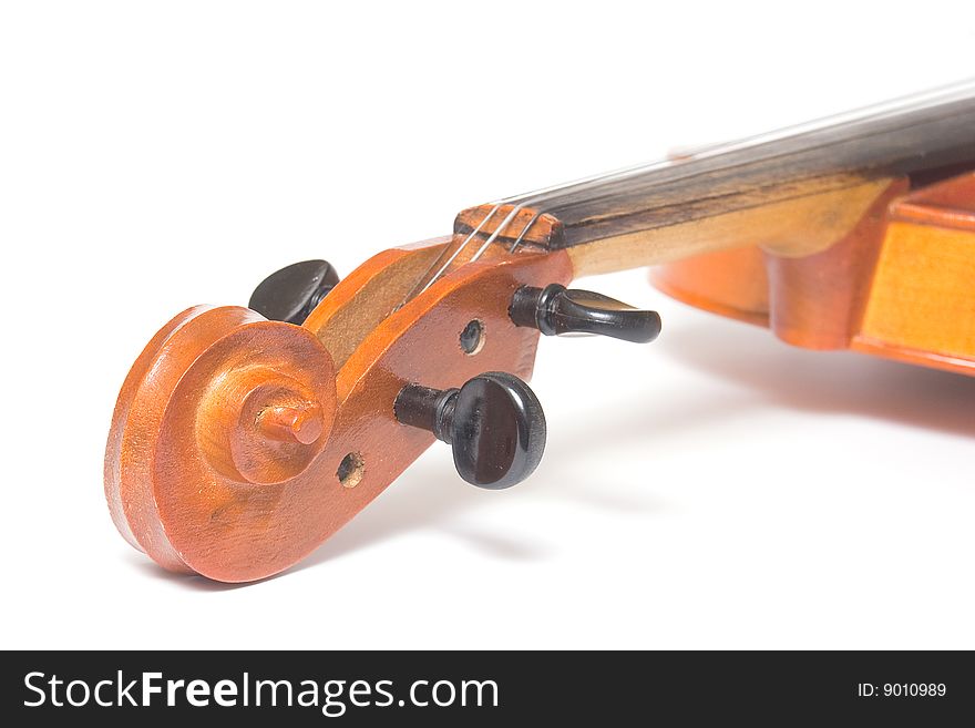 Scroll of classical violin close up isolated on white background