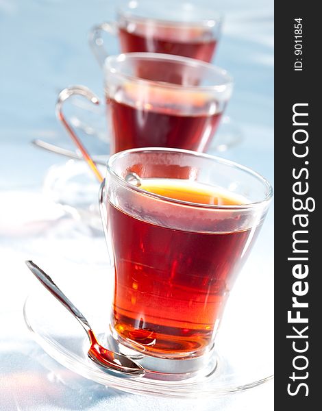 Drink series: glassy cup of tea, macro picture