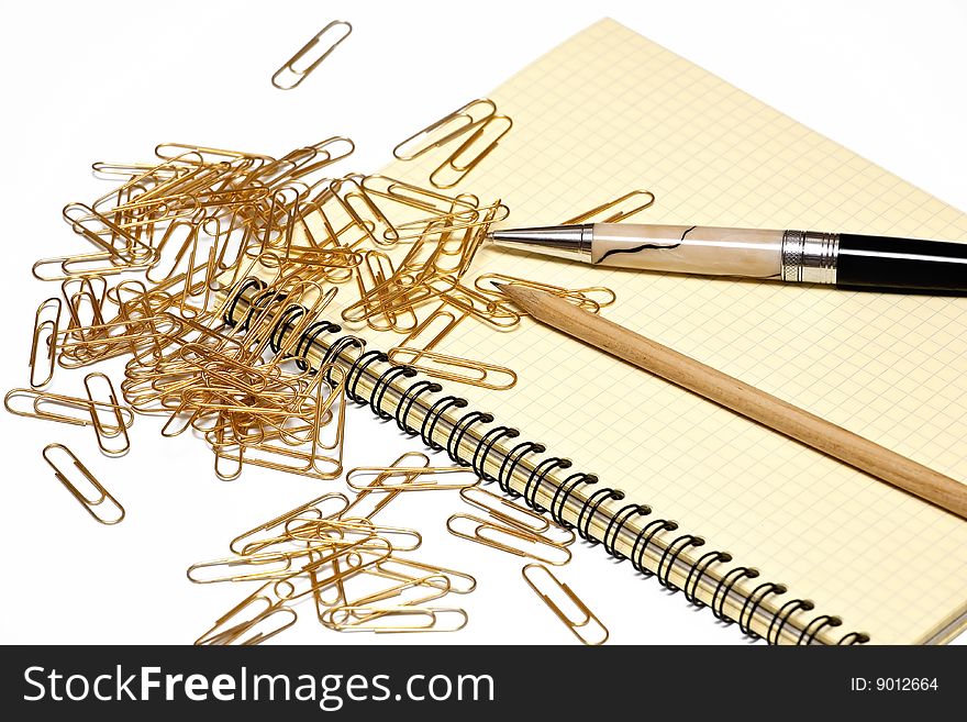 Writing set and writing-book on a white background