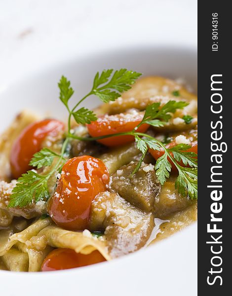 Italian pasta with tomato and mushroom