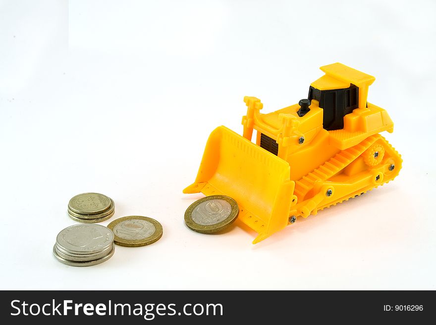 Yellow tractor rakes up money