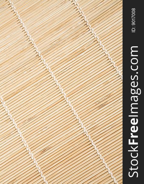 Bamboo mat with white threads texture in diagonal. Bamboo mat with white threads texture in diagonal