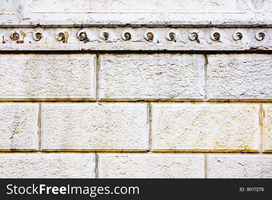 Old stone wall with small decorations