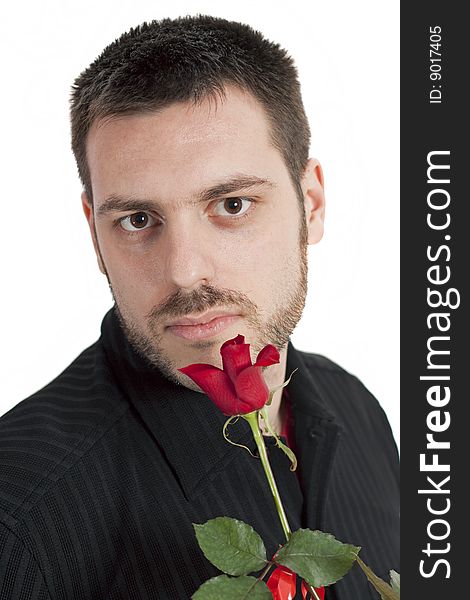 Young man holding red rose