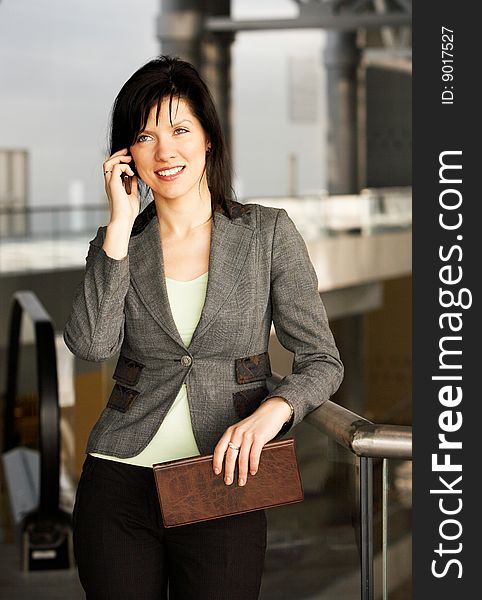 Young confident caucasian businesswoman in the working space. Young confident caucasian businesswoman in the working space