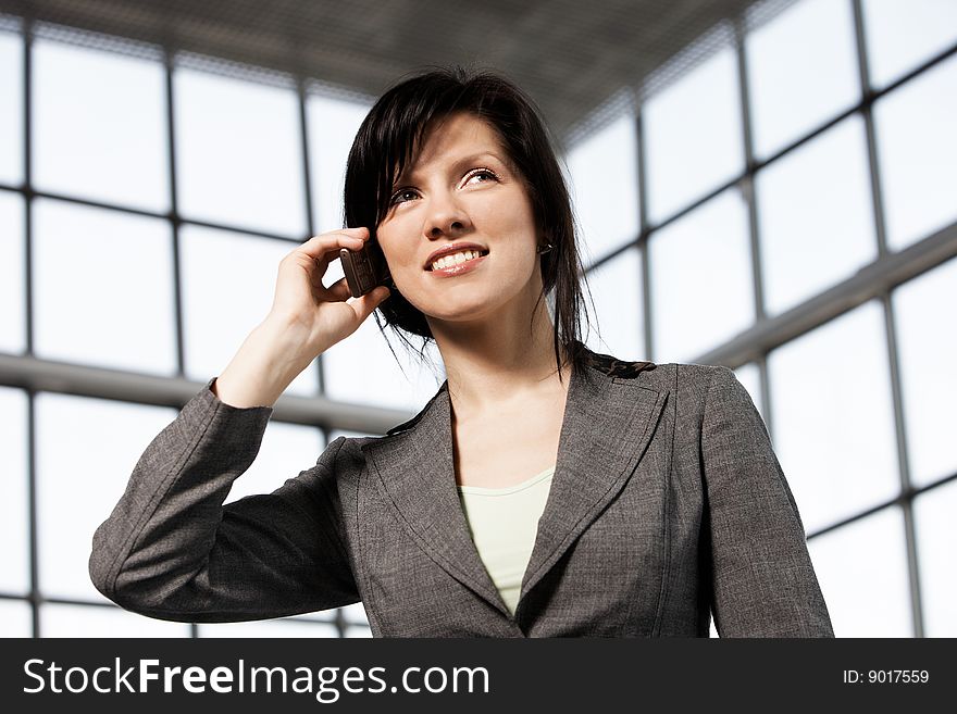 Young confident caucasian businesswoman in the working space. Young confident caucasian businesswoman in the working space