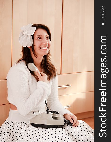 Young Girl Holding Phone Receiver