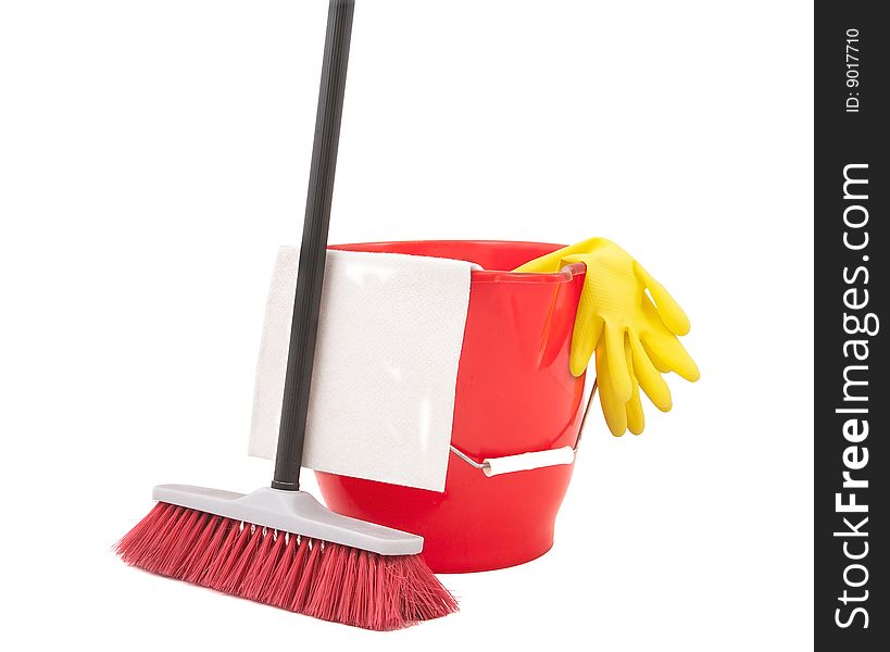 Bucket, rag, gloves and a brush on white background