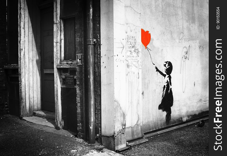 Banksy girl and balloon on Vestry street just off Old Street, London UK. It&#x27;s no longer there as the building you see on the left has been renovated and the wall painted over. Note on usage: This image is free to use for non-profit activity and for personal projects like CD covers and canvases. DON&#x27;T use it to make money. Don&#x27;t sell canvases/prints of this image. Full respect goes to Banksy for creating such an iconic image. Banksy girl and balloon on Vestry street just off Old Street, London UK. It&#x27;s no longer there as the building you see on the left has been renovated and the wall painted over. Note on usage: This image is free to use for non-profit activity and for personal projects like CD covers and canvases. DON&#x27;T use it to make money. Don&#x27;t sell canvases/prints of this image. Full respect goes to Banksy for creating such an iconic image.
