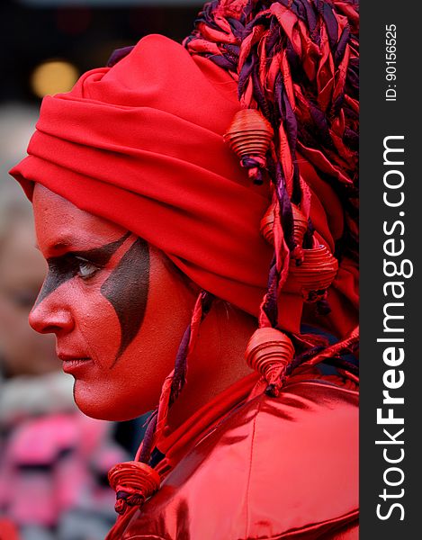 Woman Wearing Red And Purple Head Wrap