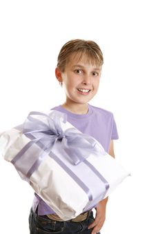 A Boy Holding A Wrapped Present Stock Photography A Boy Holding A Wrapped Present Stock Photography