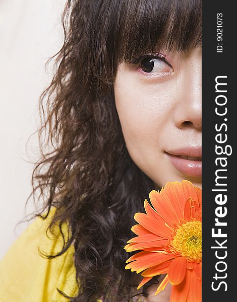 A girl holding a flower, concise and beautiful pictures. A girl holding a flower, concise and beautiful pictures