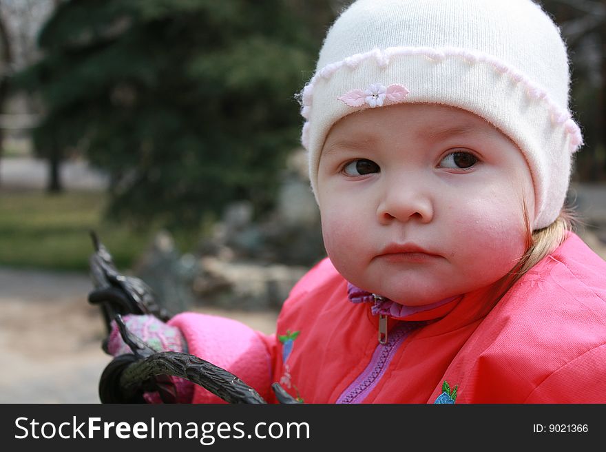 The Thoughtful Child Sits In The Street