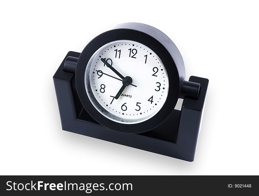 Black desk clock on a white background isolated