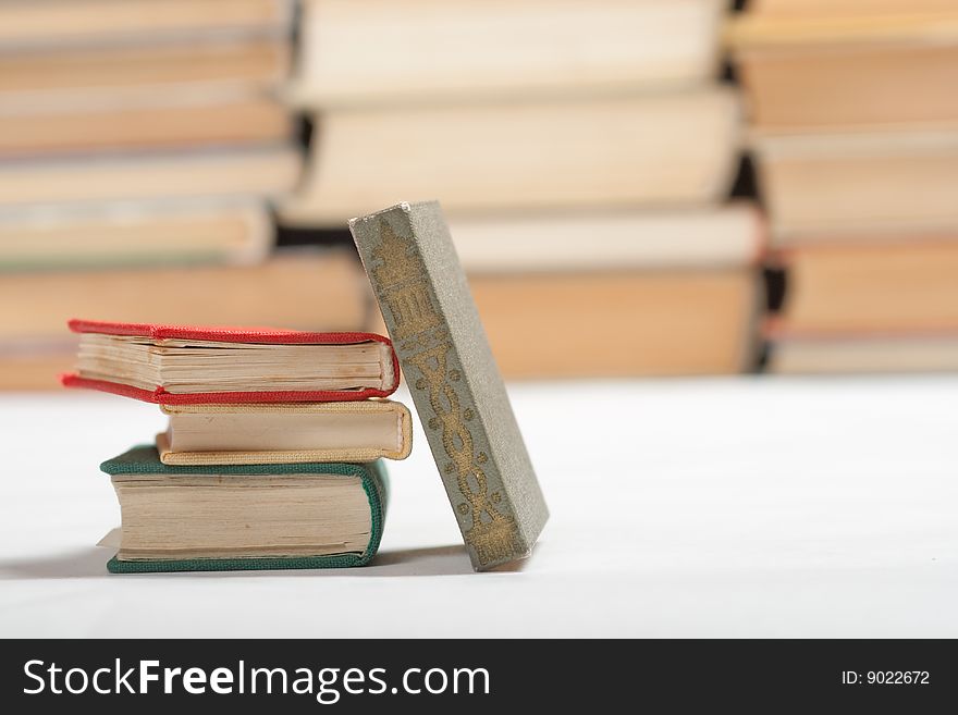 Small books on white background