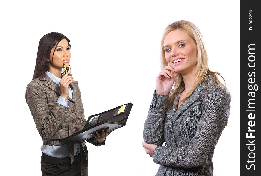 Female business team isolated on white in the studio