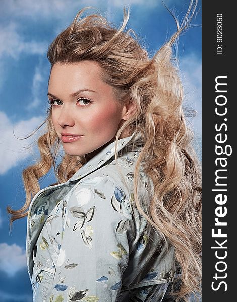 Portrait beatiful woman with hair on the wind isolated in studio. Portrait beatiful woman with hair on the wind isolated in studio