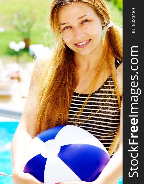 Happy Beautiful Woman With Ball On Holiday