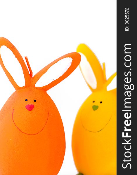 Two easter's rabbits ,orange and yellow