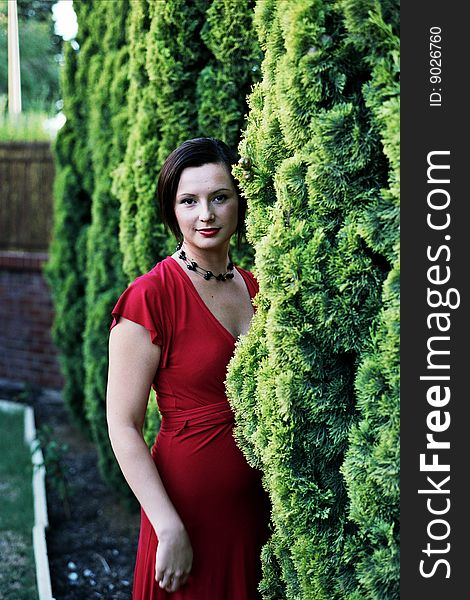 Red Green Retro Portrait of a young woman in a red dress