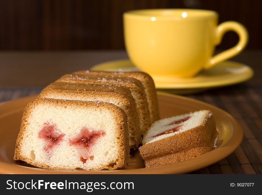 Slice of a sweet pie and tea cup