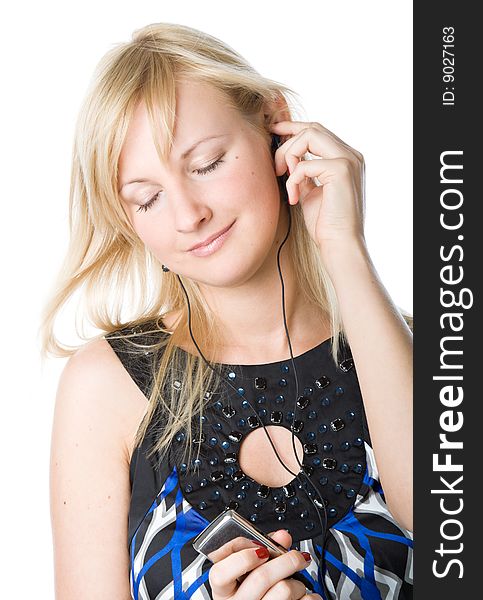 A beautiful young girl listening to music