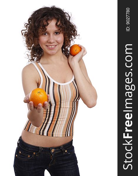 Beautiful young girl with orange. Pretty Woman and Fruit Diet Series. Smiling healthy woman is holding the orange in her hand. Isolated over white background. Beautiful young girl with orange. Pretty Woman and Fruit Diet Series. Smiling healthy woman is holding the orange in her hand. Isolated over white background.