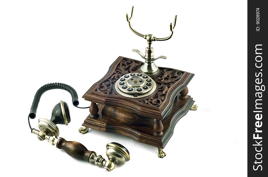 Old-fashioned telephone with picked up handset