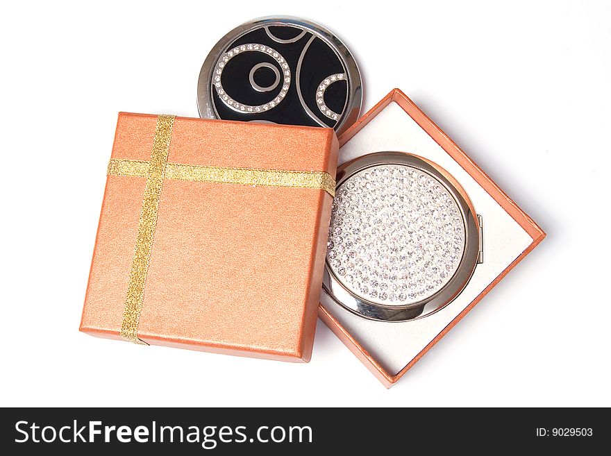 Gift box and hand mirrors, isolated on white background