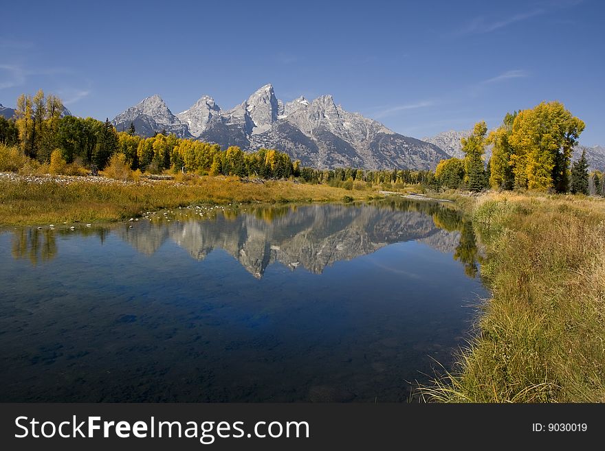 Grand Teton National Park in the fall showing reflections