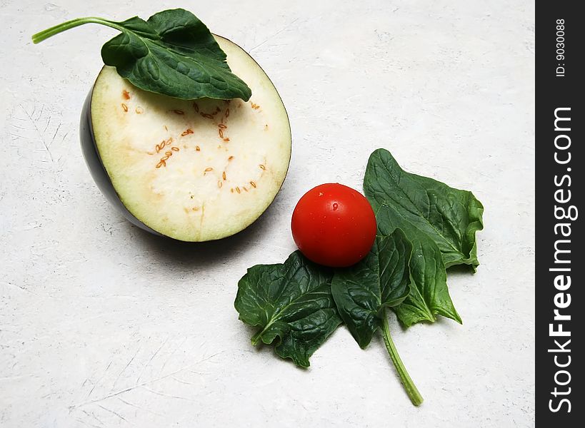 Fresh vegetable - eggplant, spinach and tomato.