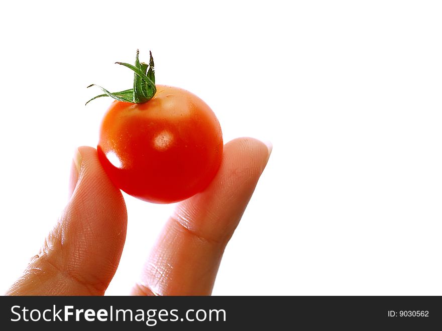 Close up capture fresh red tomato on hand. Close up capture fresh red tomato on hand