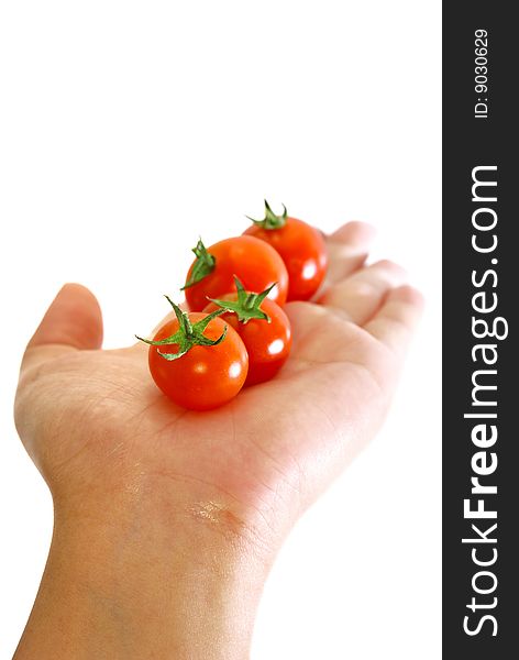 Close up capture fresh red tomato on hand. Close up capture fresh red tomato on hand