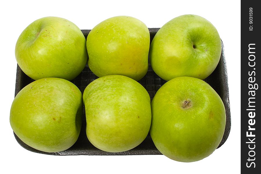 Group of green apples on the plate