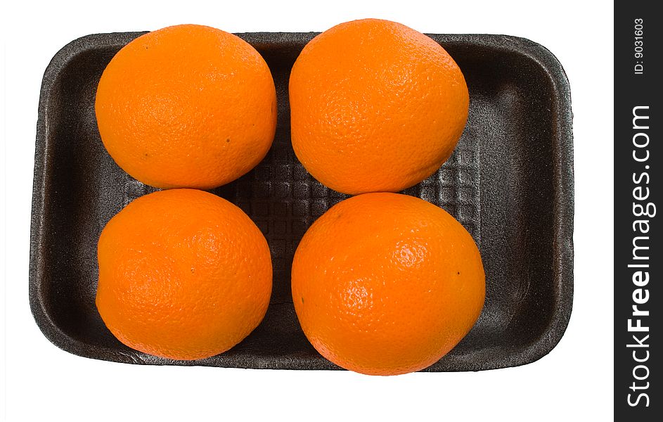 Group of oranges on the plate  isolated over white with clipping path