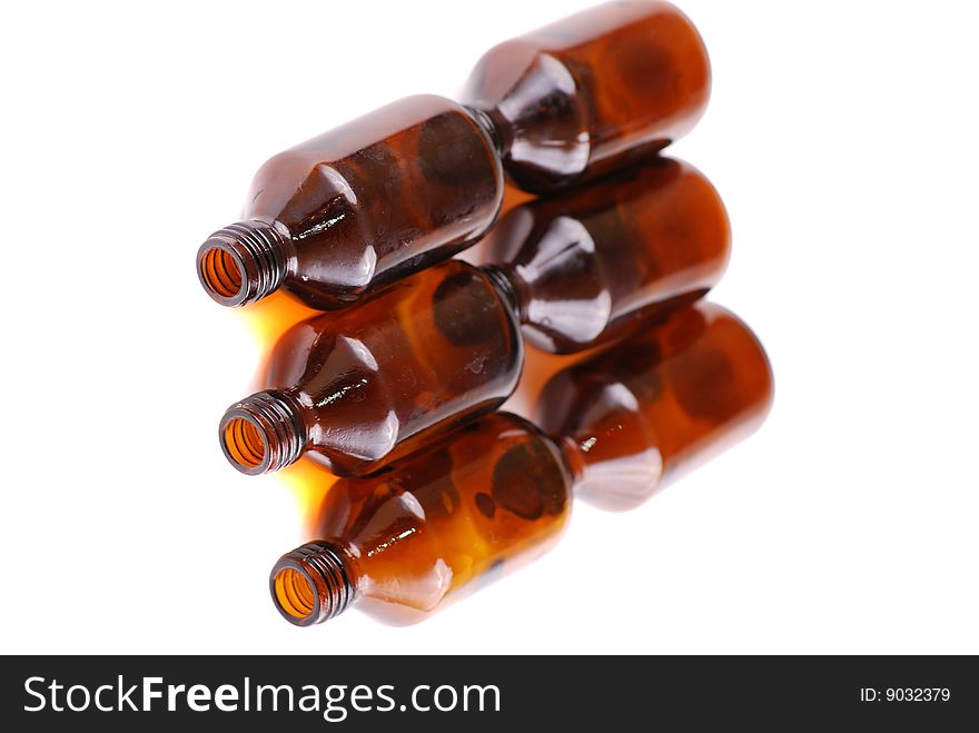Brown vials for storage of medical preparations and chemical reactants.