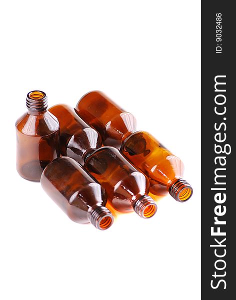 Brown vials for storage of medical preparations and chemical reactants.