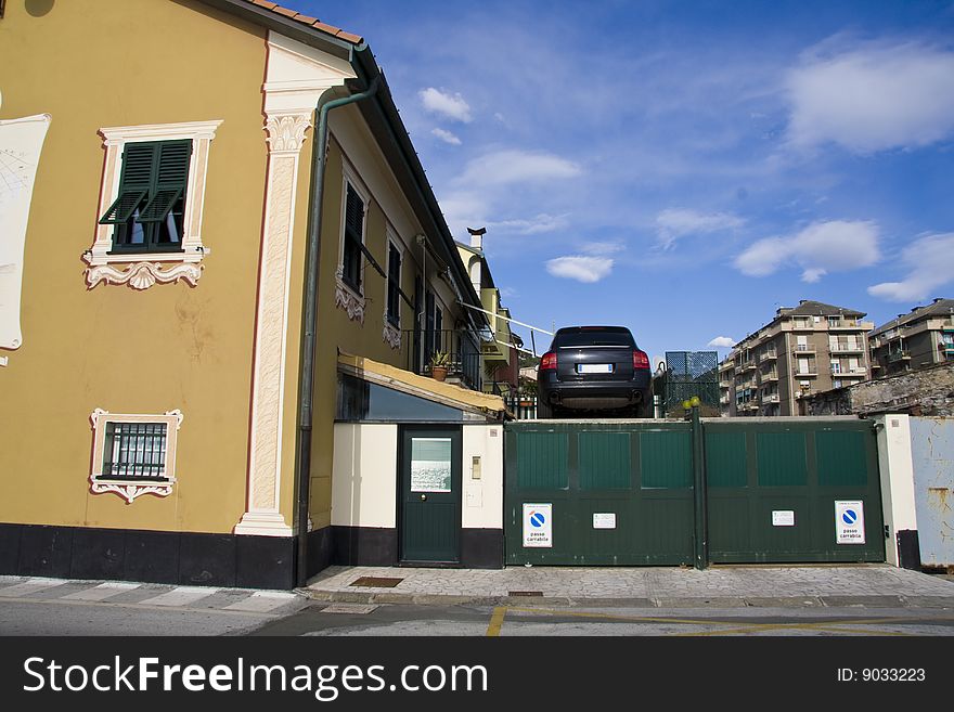 Elevated parking, the car is out of the windows at first floor. Elevated parking, the car is out of the windows at first floor