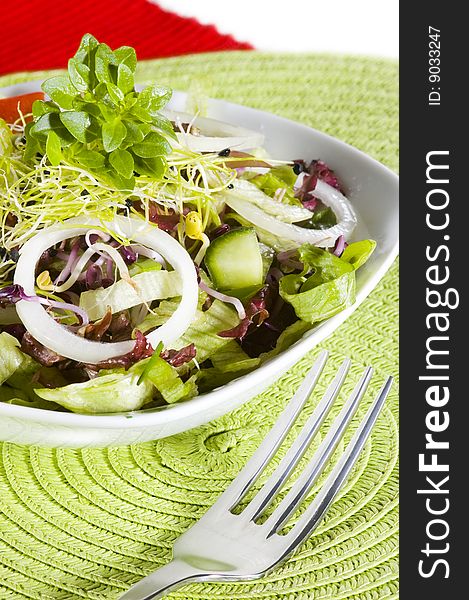 Fresh vegetables salad with colorful background