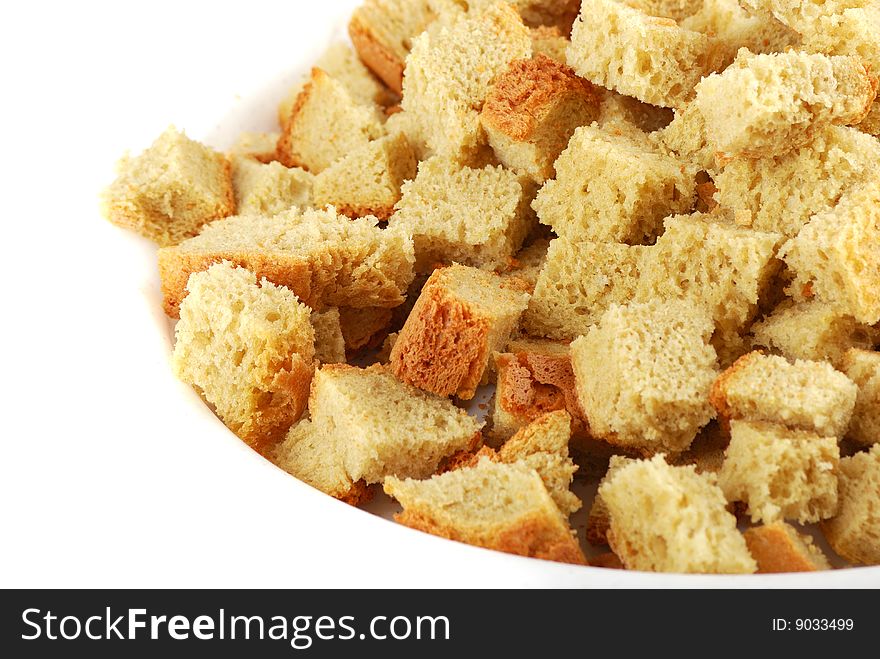Grain crackers from a white loaf cut with cubes also are roasted.