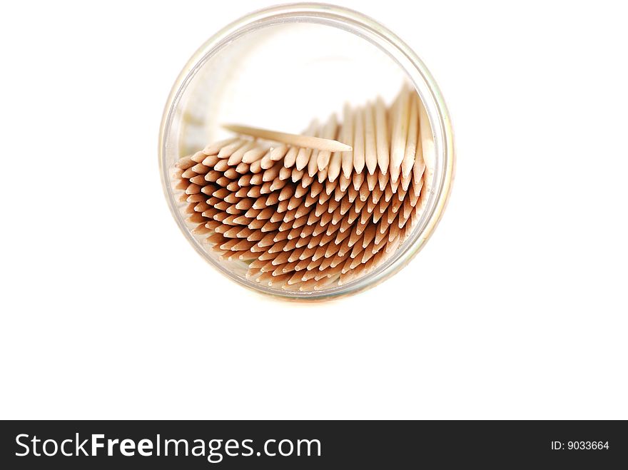 Considerable quantity of toothpicks in a special jar for convenient storage.