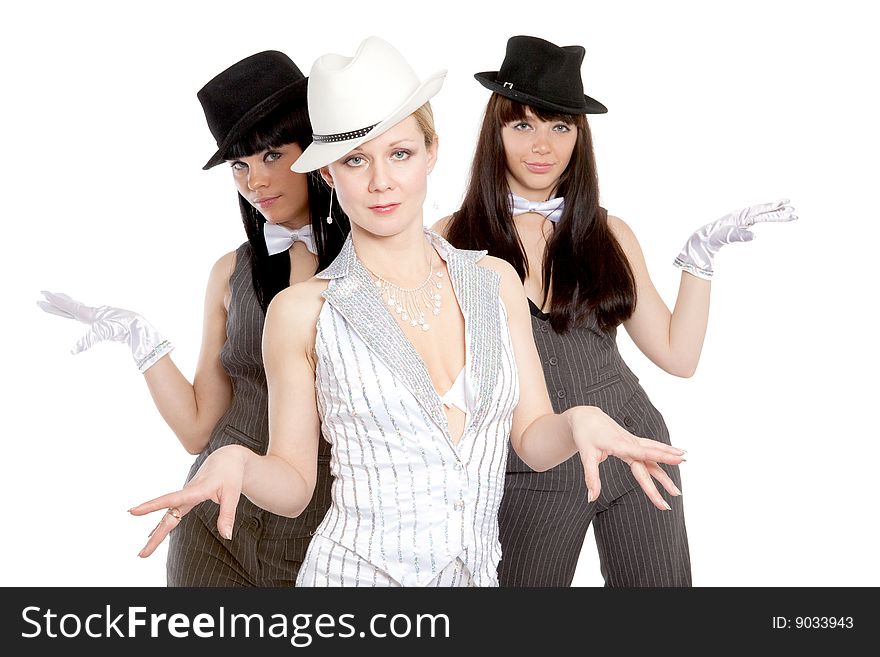 One blond and two brunette woman in striped suits and hats. One blond and two brunette woman in striped suits and hats